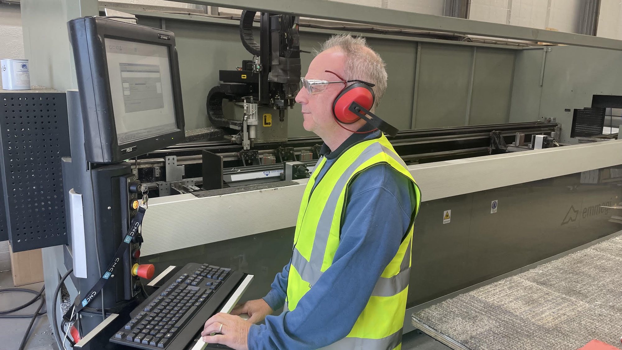DIW technician operating the CNC machining centre