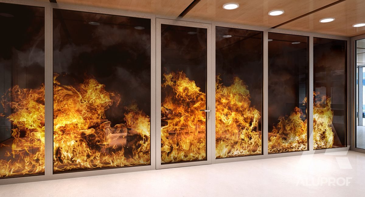 Fire-rated glazed screen holding back flames